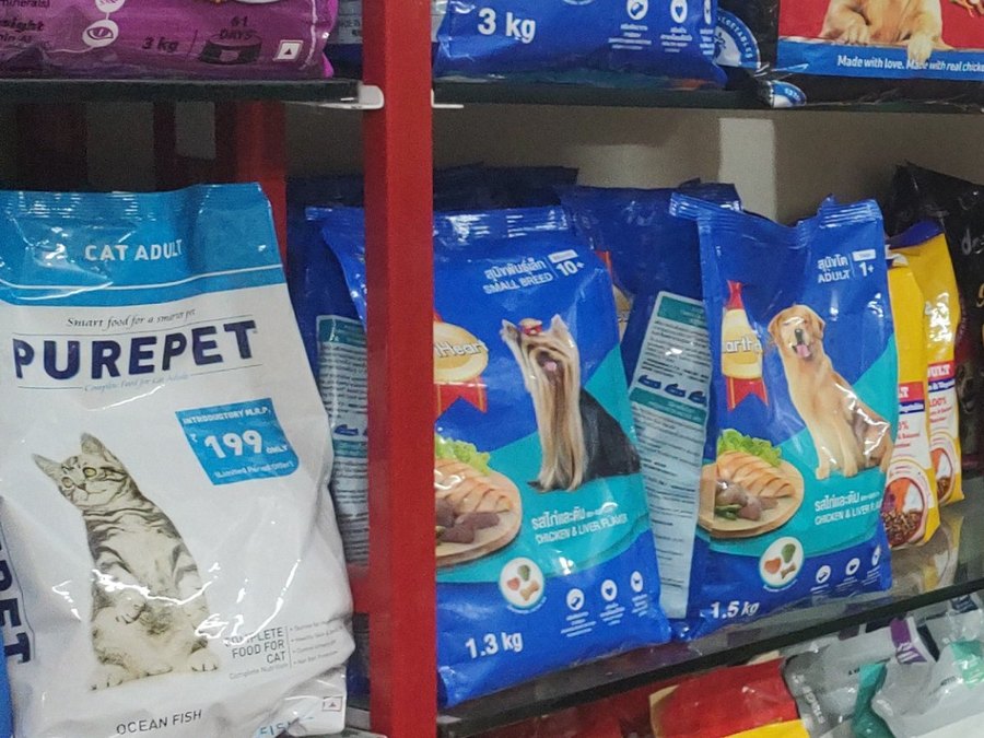 Purepet, Whiskas and Drools cat food on the shelves at Shree Swami Samarth Pets Shop, Ulhasnagar